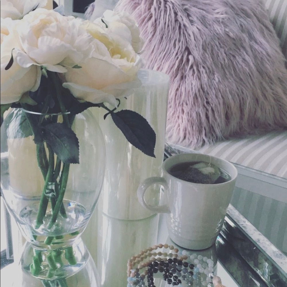Two mauve pillow covers and pillows. Super cute for a bachelorette pad!
